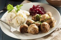 Traditional sides complement Swedish meatballs.
