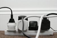 A surge protector in a power strip can protect many devices at once.
