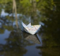 Adding a clear coat to origami hardens it and provides water resistance.