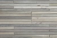 Close-up of a deck surface, made of plastic wood planks
