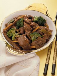 Beef changes to a brown color during the cooking process.