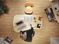 A business worker in a tidy office.