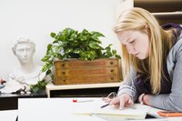 Manga artist drawing on paper.