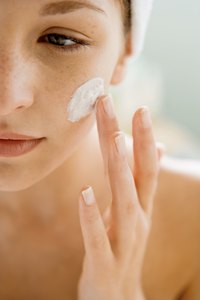 Apply regenerating cream to help restore skin overnight.