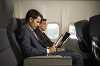 Businessman sitting on an airplane