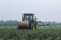 An ATV spray boom is a smaller, simpler version of large-scale agricultural equipment.