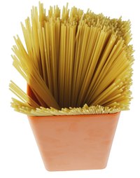 Add a ribbon to a plain container of spaghetti for a simple decoration.