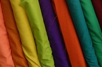 A fabric sample book can show off a variety of different fabrics.
