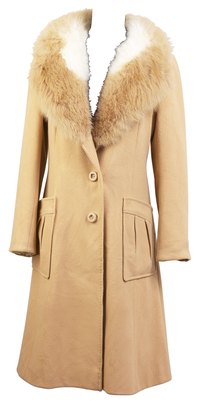 Dry cleaning keeps golden tan camelhair in good condition.