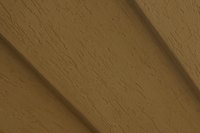 HardiePlank lap siding is easily installed using a jig for correct overlaps.