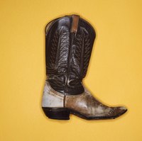 Worn-in boots can have spots of disocloration for an aged effect.