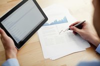 Researching stocks on a tablet