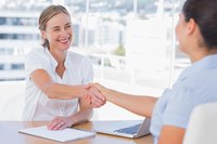 Woman interviewing a job applicant.