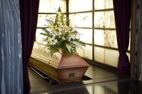 Coffin with flowers.
