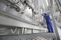 A maintenance worker in an industrial setting.