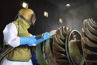 Sandblasters work with compressed air and abrasives like glass beads.