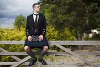 With the traditional kilt jacket and brogues, the classic kilt can go formal.