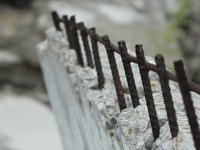 Concrete foundations are reinforced with rebar for additional strength.
