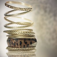 Improve the look of lackluster bracelets with bright-colored enamel paint.