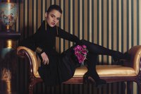 Go for a sultry, all black look by adding opaque tights and a turtleneck under your LBD.
