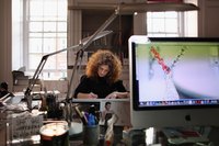 A product designer working at her desk.