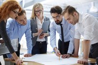 Business leader holding group meeting