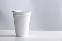 Transform plain foam cups into cute baby-bootie favors.