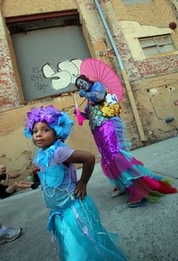 Make kids walking mermaid costumes.
