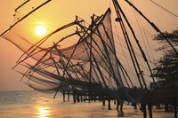 The Chinese fishing nets set up on the shore are a symbol of Kochi.
