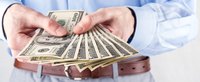Man holding cash