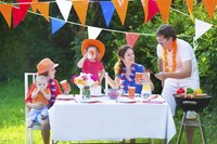 Create hanging pennants in bright colors from paper or fabric.