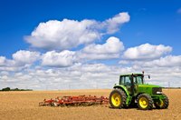 Make a cardboard tractor for a farm-themed birthday party.