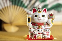 Giving a good luck charm such as this Japanese sculpture to a new business owner might make a good gift idea. This Maneki Neko cat sculpture is said to bring good luck to the owner.