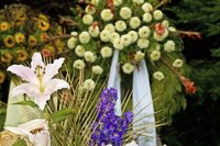Keep memories of a loved one close with jewelry made from the funeral flowers.