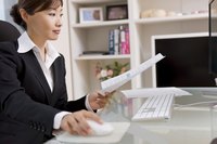 Image of a working business woman.