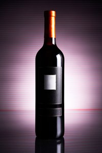 Empty wine bottles can be used to create beautiful and functional vases.