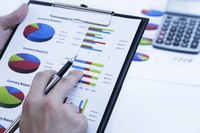 Business chart filled with sales data graphs