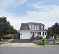 A home for sale sign.