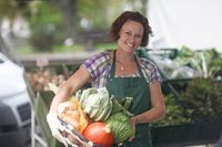 A worker at a farmers market.