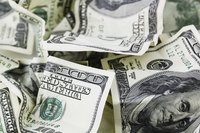Close-up of crumpled cash pile