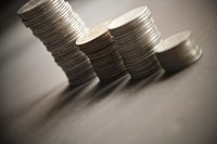 A financial bar graph built with stacks of coins.