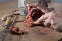 Create the rough shape first by pinching, pulling, molding and smoothing with tools and your hands.