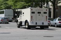 Armored vehicle transporting cash