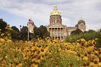 Iowa has no state law requiring employers to pay time and a half for hours over 40.