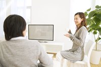 Image of a couple watching TV.