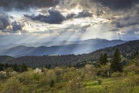 Trains climb over green rolling hills just outside Asheville, North Carolina.