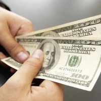 What happens to stock options when a company is bought