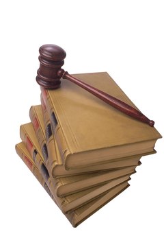 Gavel on stack of legal books