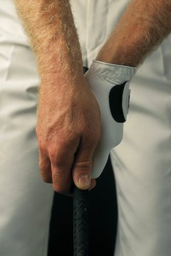 In a strong golf grip, the right thumb is pointed slightly right-of-center.