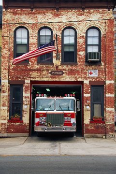 Fire engine parked in firehouse